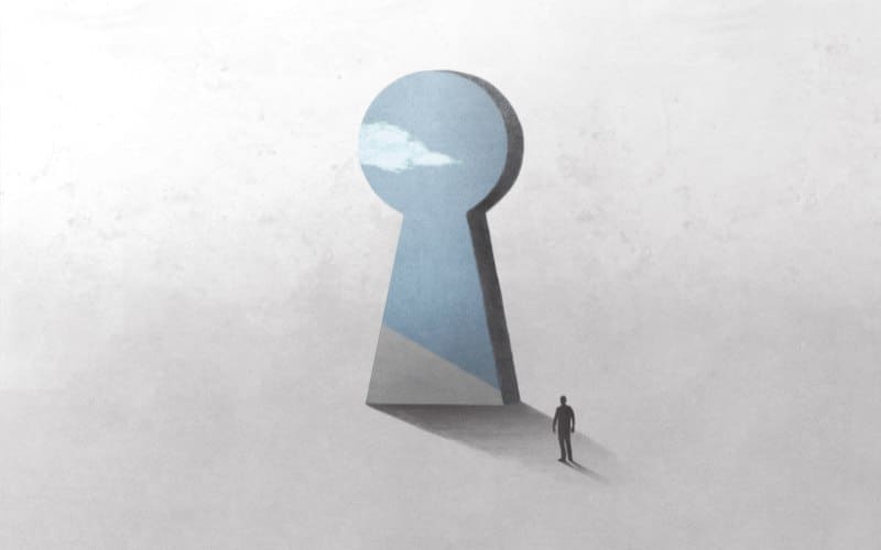 A human stands at virtual key hole door, searching for the answer to "Who am I?"